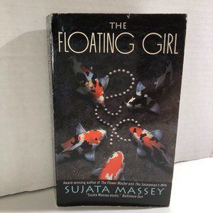 ⭐️The Floating Girl Mass Market Paperback – 2001 by Sujata Massey